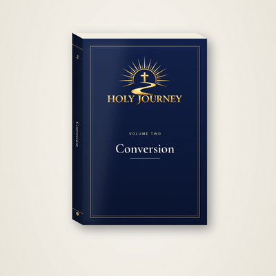 Holy Journey Volume 2: Conversion, softcover, gold logo on navy